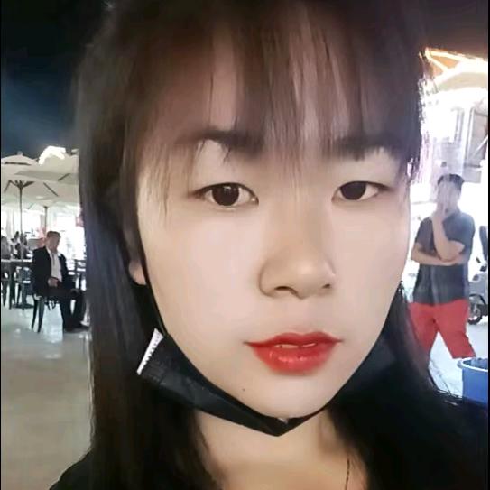 微微一笑。