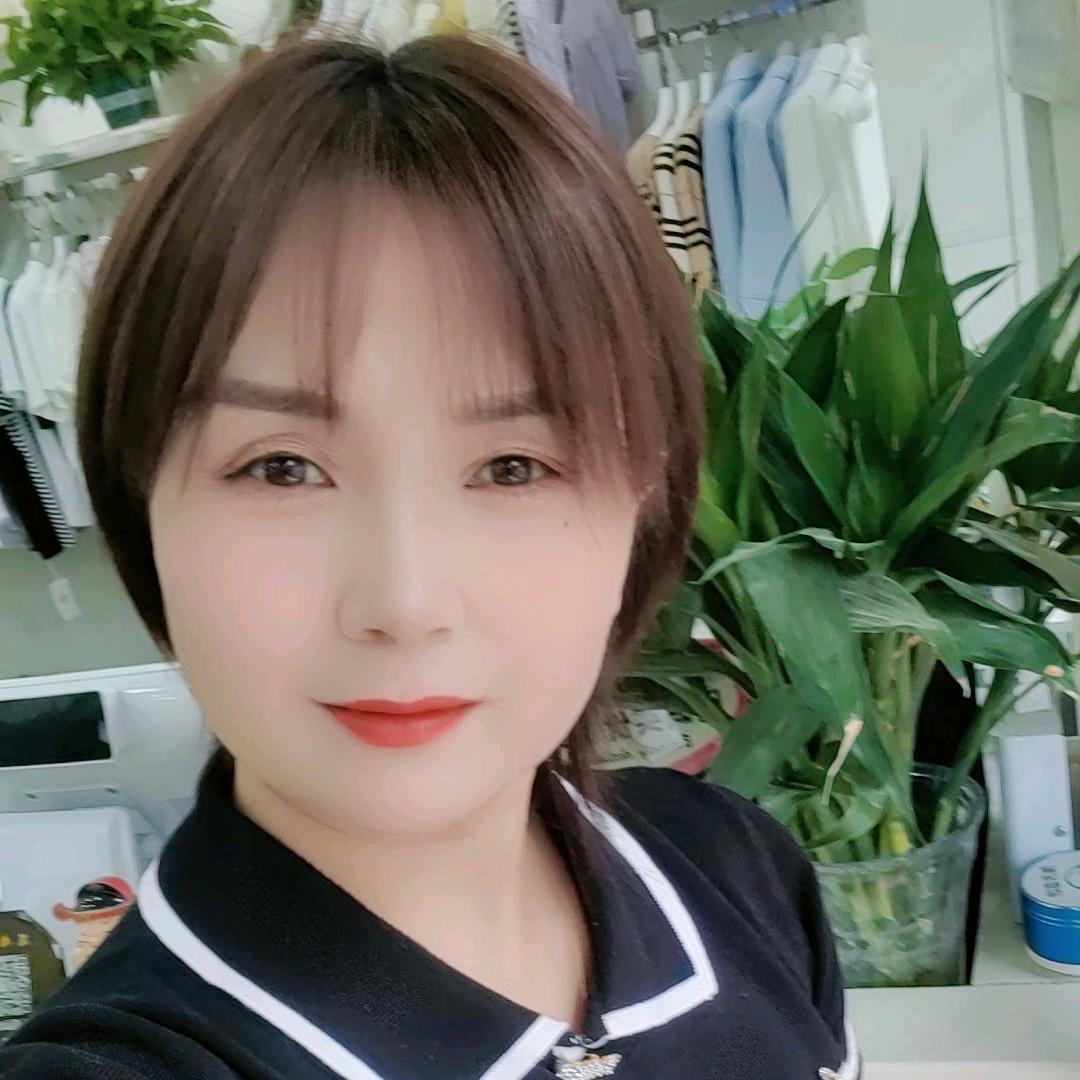 程村简尚服饰晓红