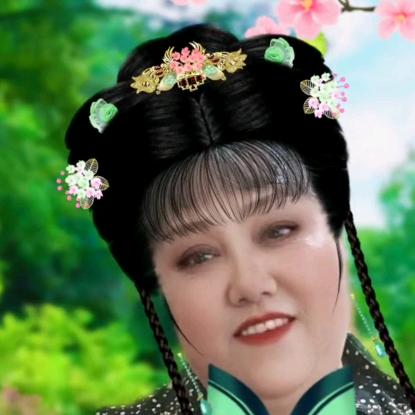 尹菊.