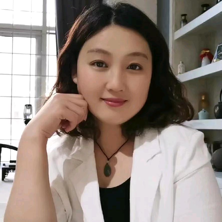 嫣然