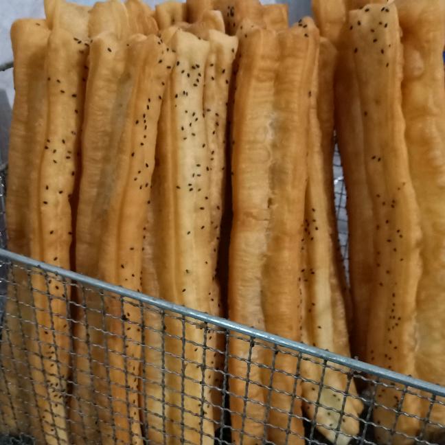 不见不散油条店