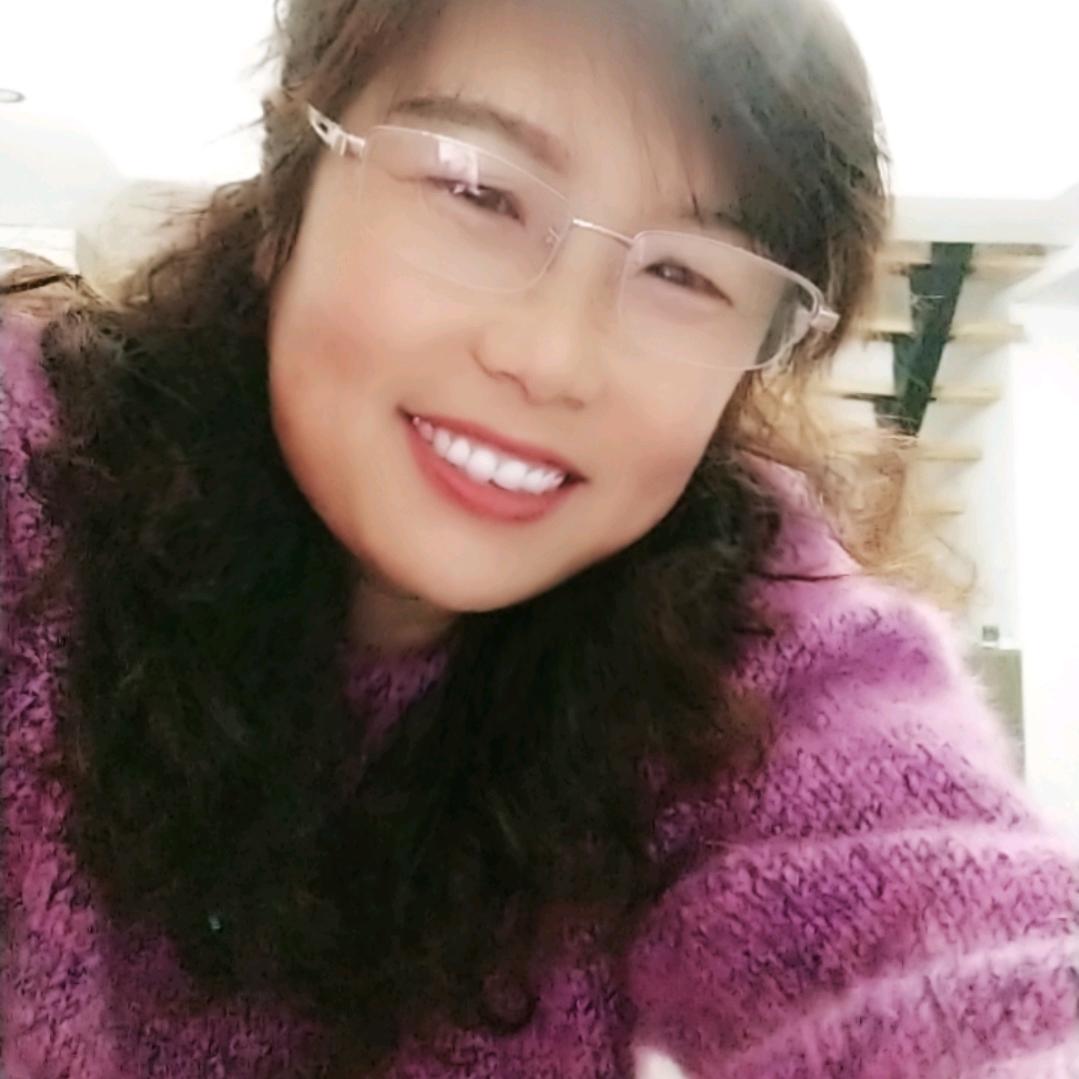 李华