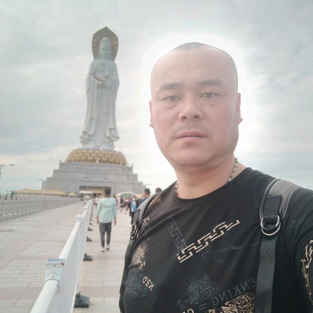 东  旭