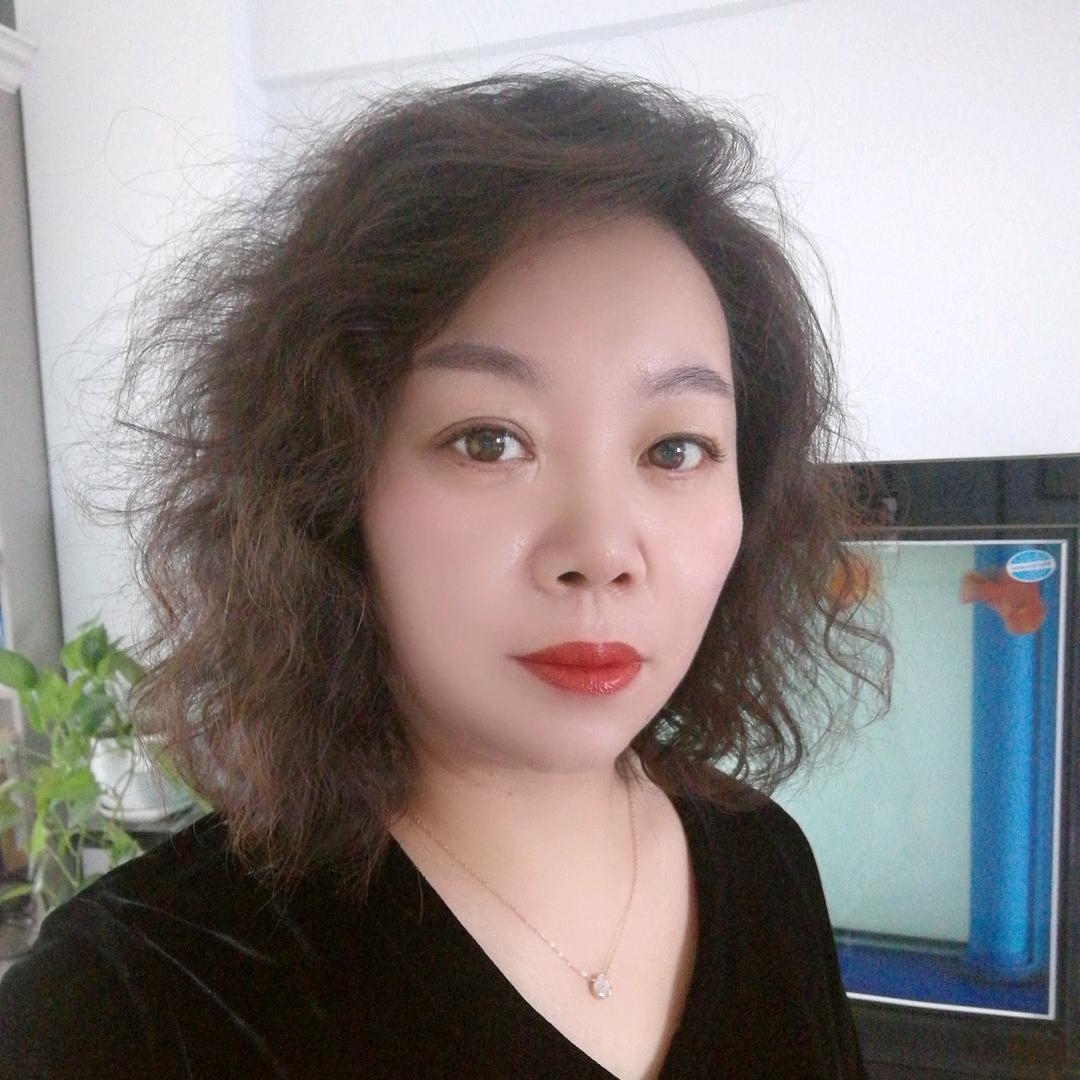 魏~妮