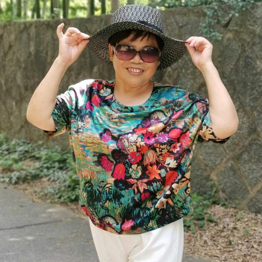 菊子姐（敎唱歌龙老师学员〉