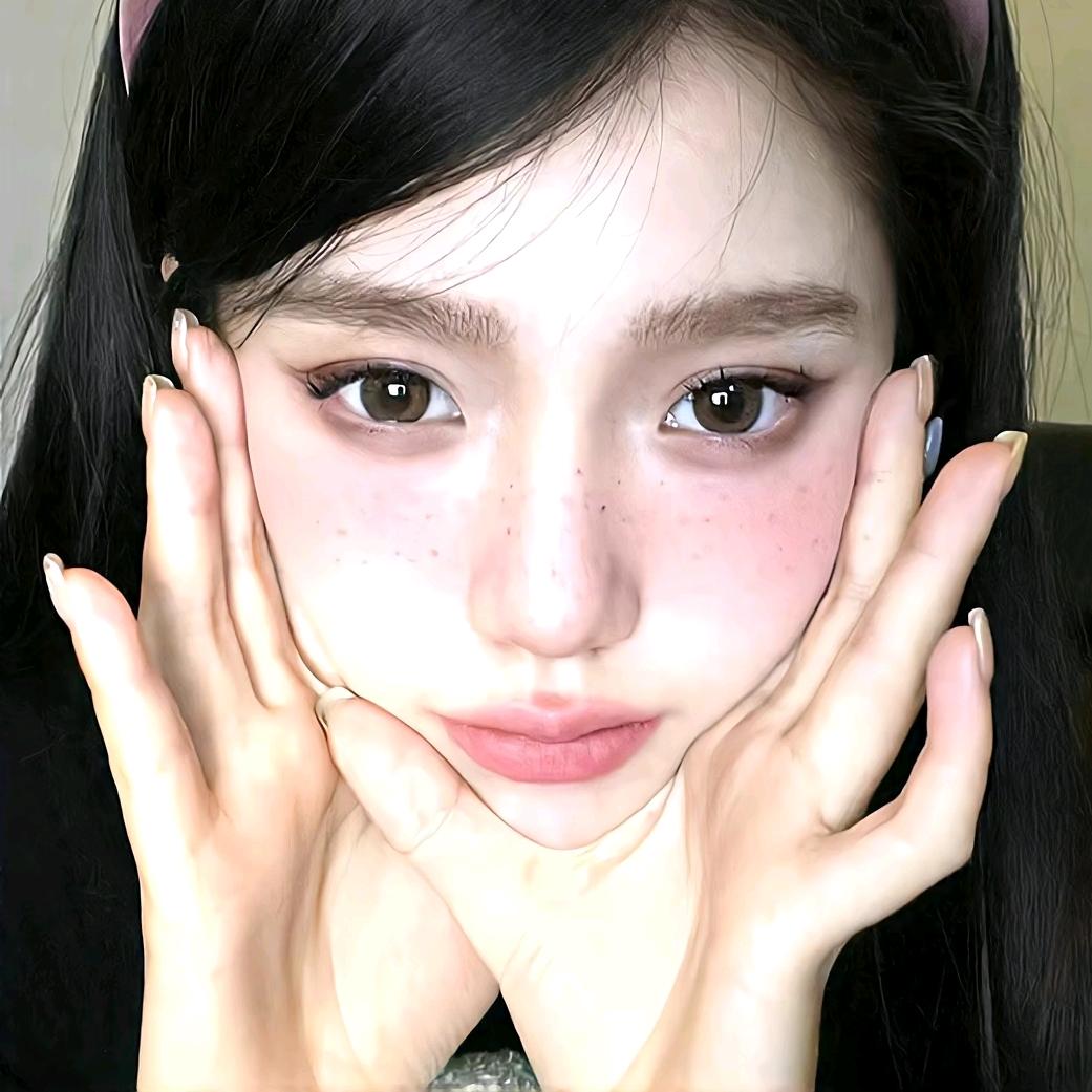 妮.