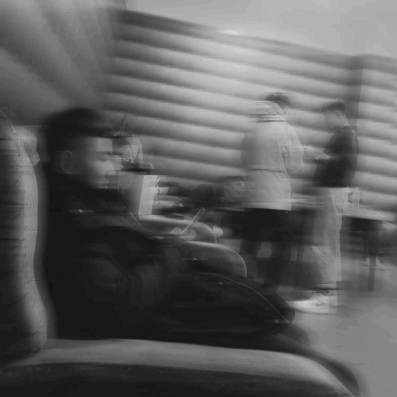 T.