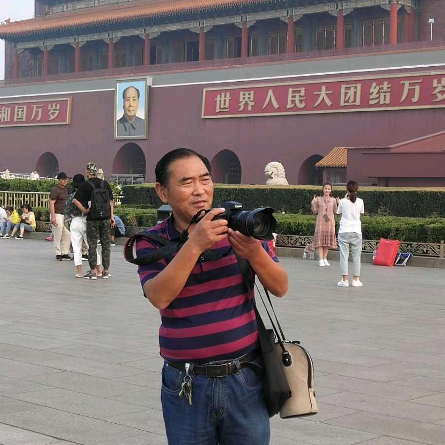 谢万柏摄影师