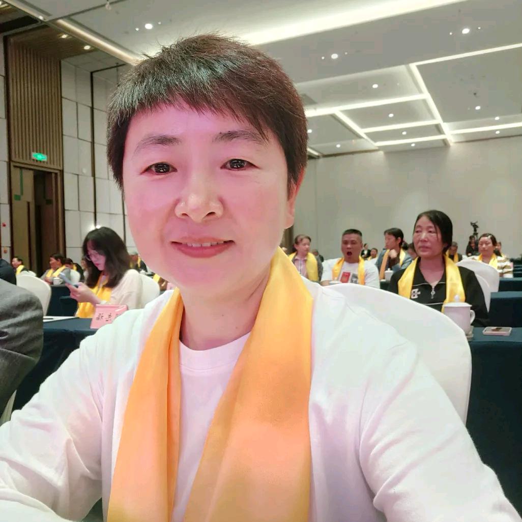 天一旅游胡美英