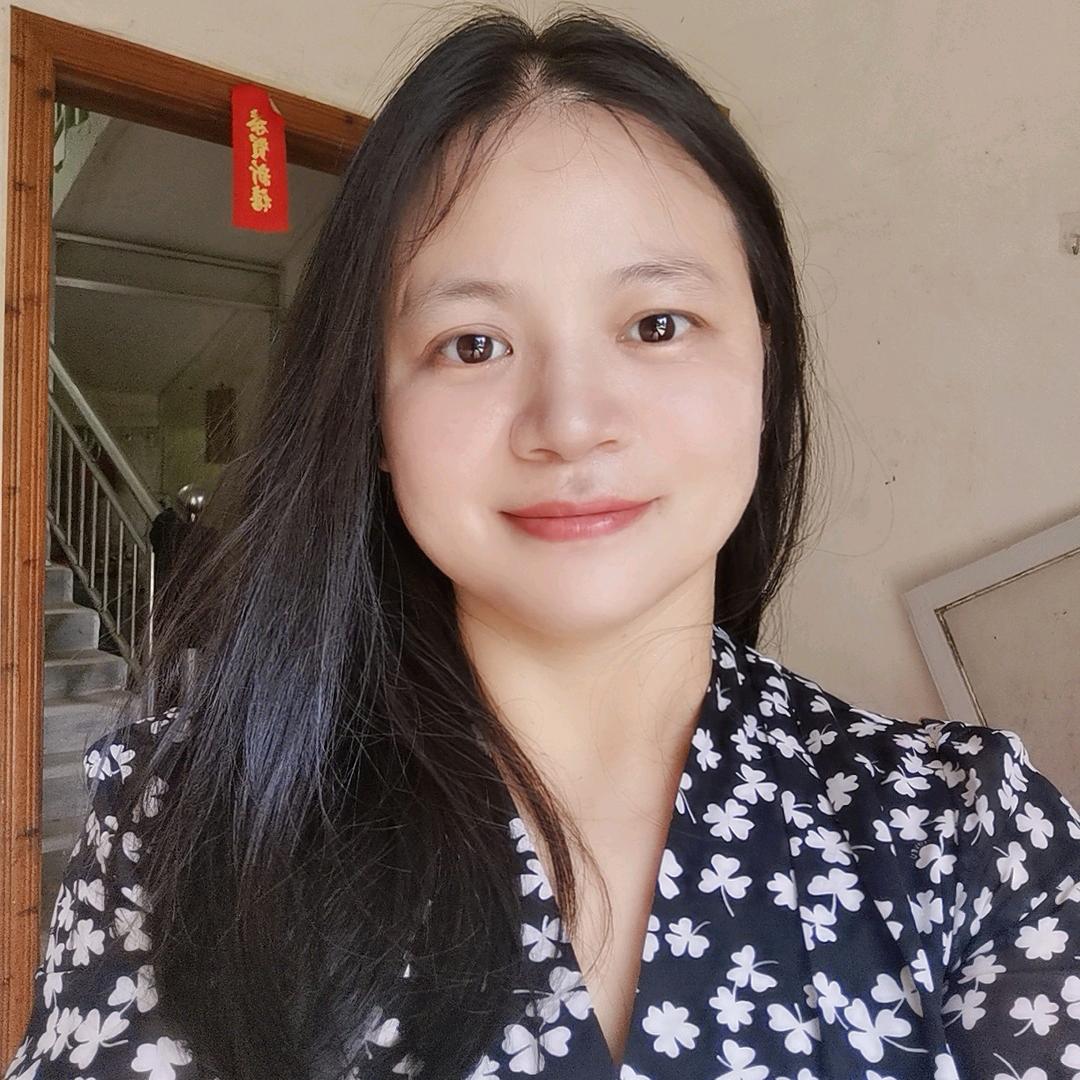 黄育美