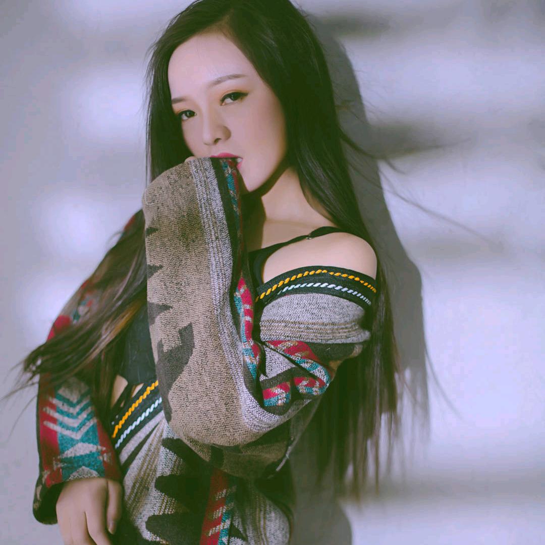 韦 唯