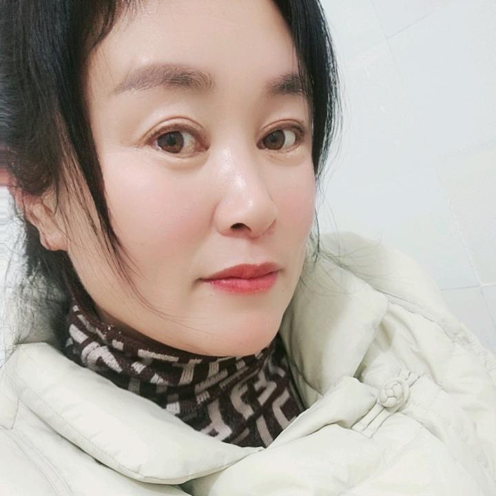 淡淡一笑