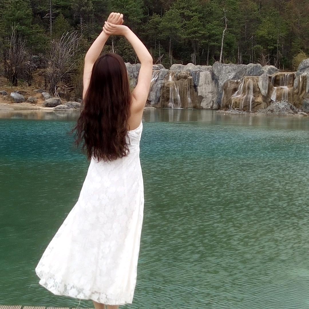 @紫荆花下的目夕