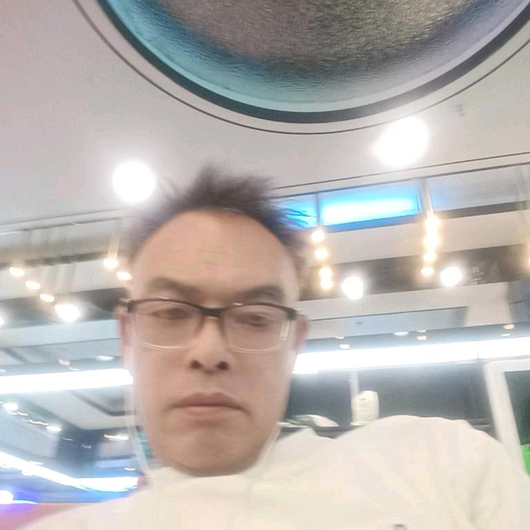 麦振江