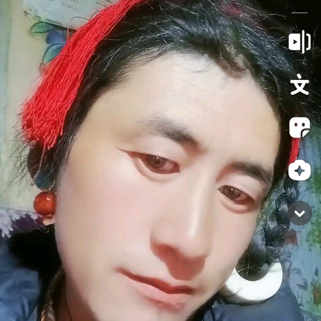 旦增久美