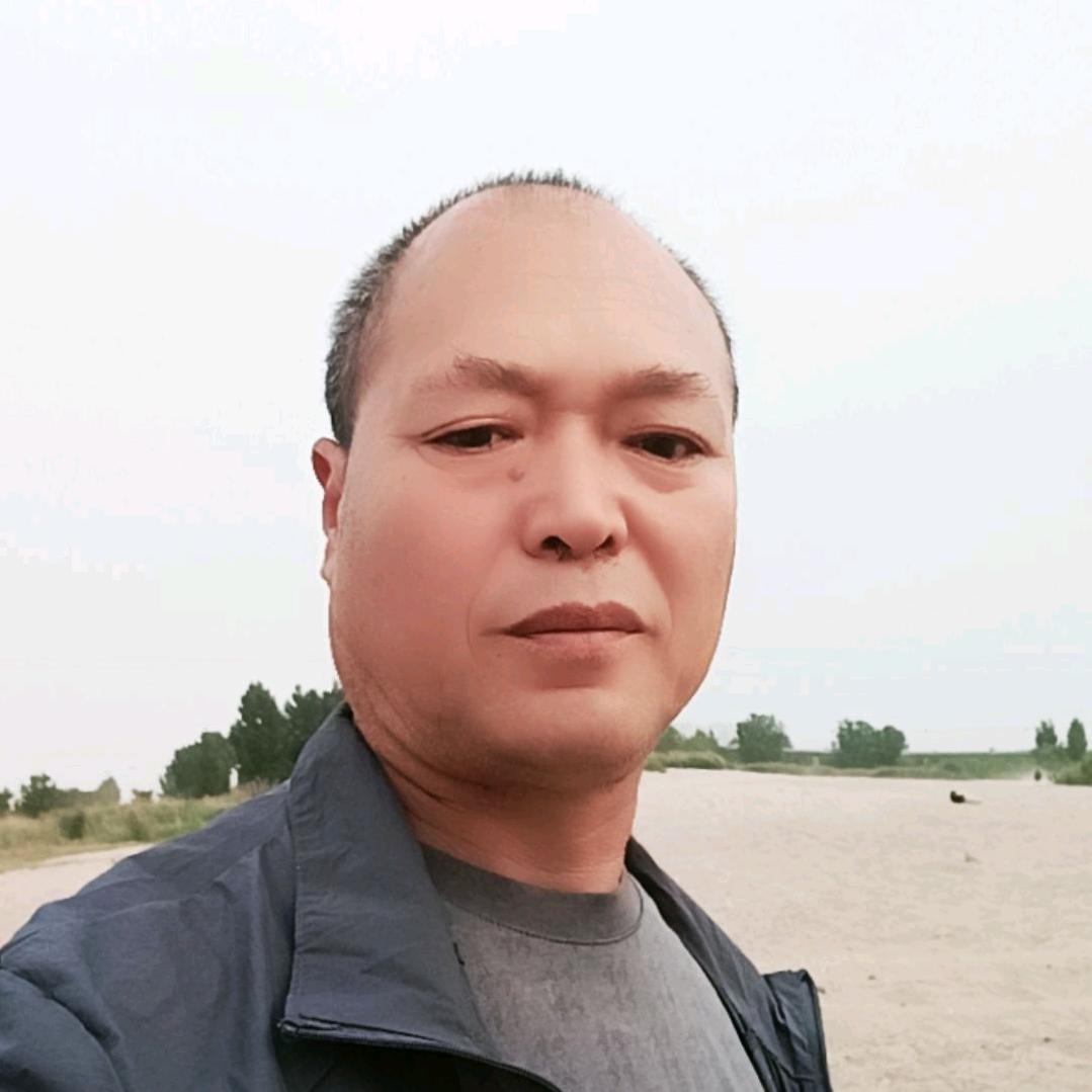 老张