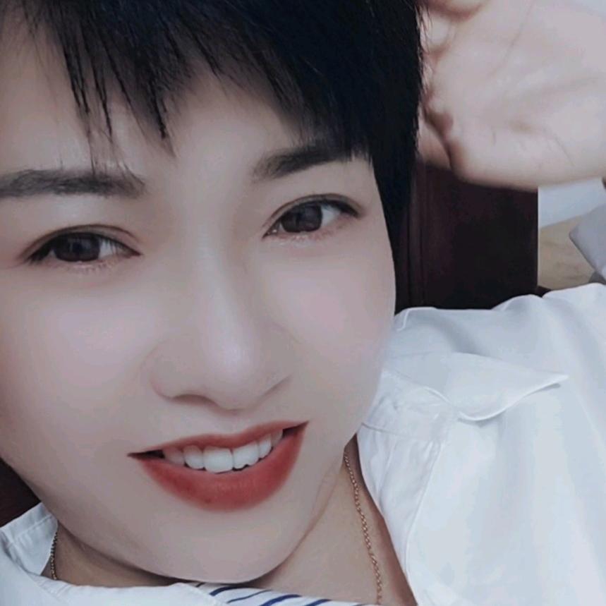 淡然一笑