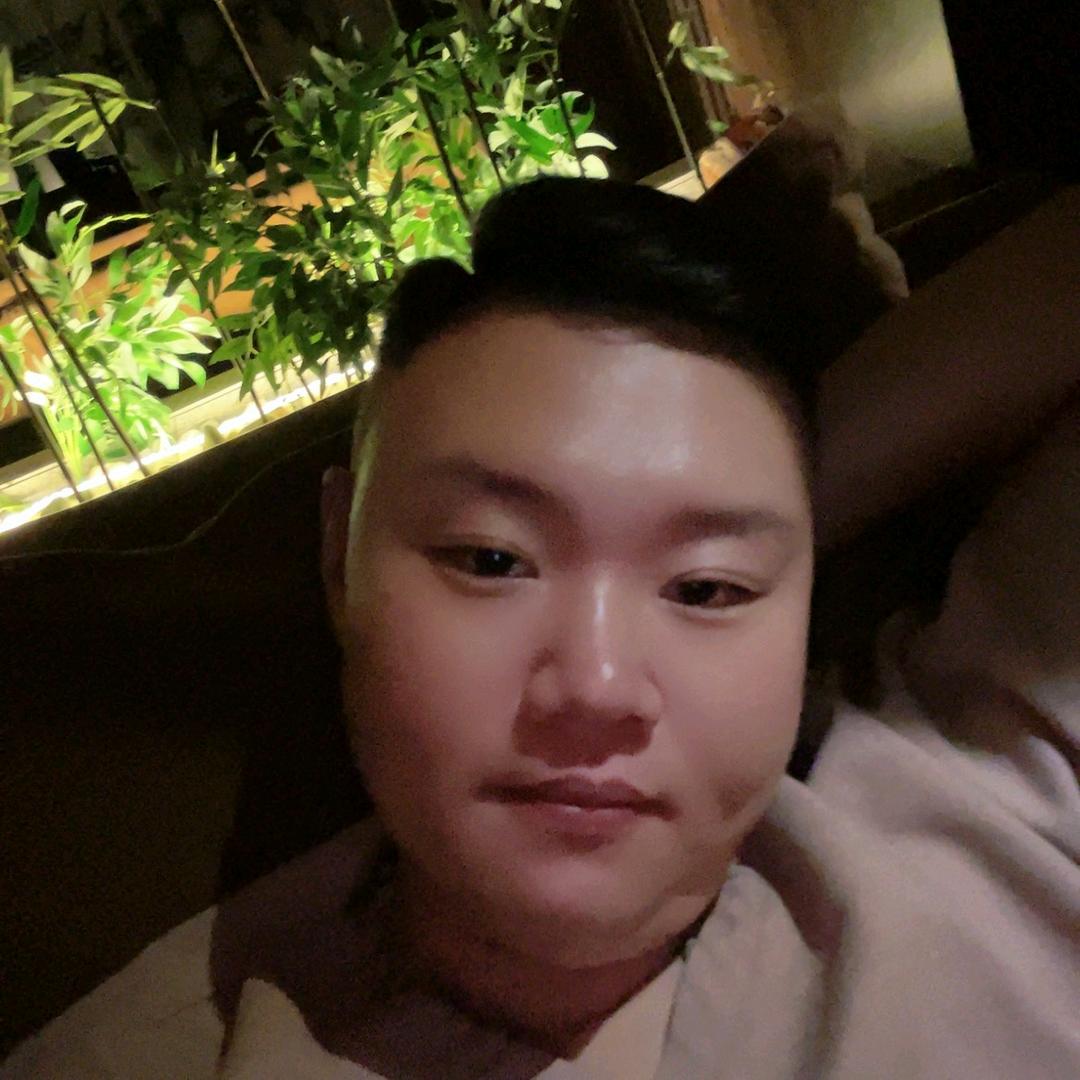 張..