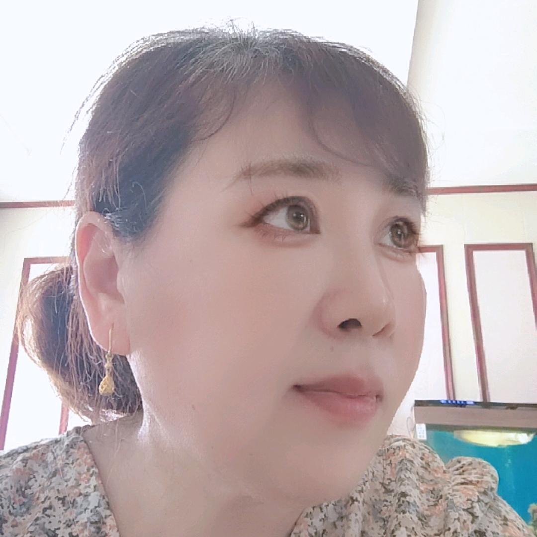 花锦年.