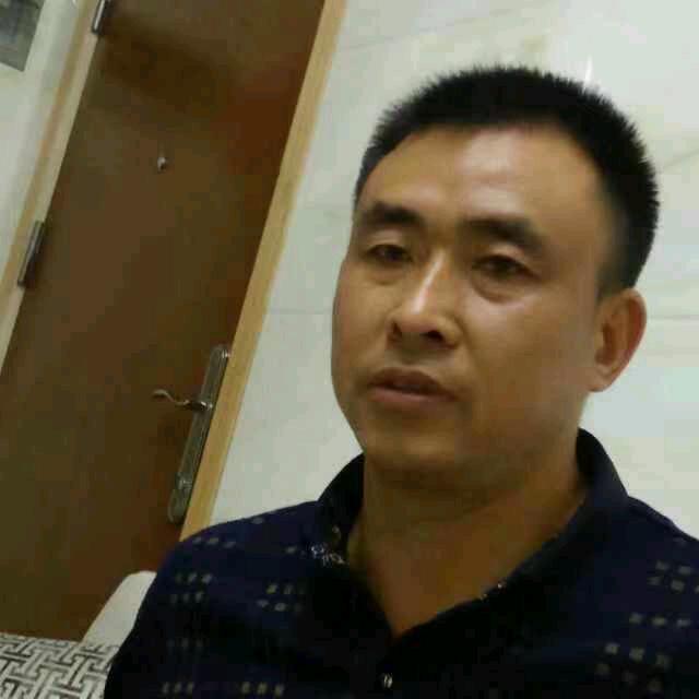 梁国明