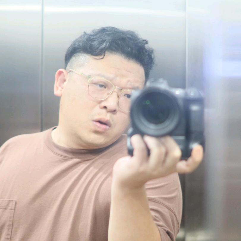 梁肿（纸包鸡的哥）
