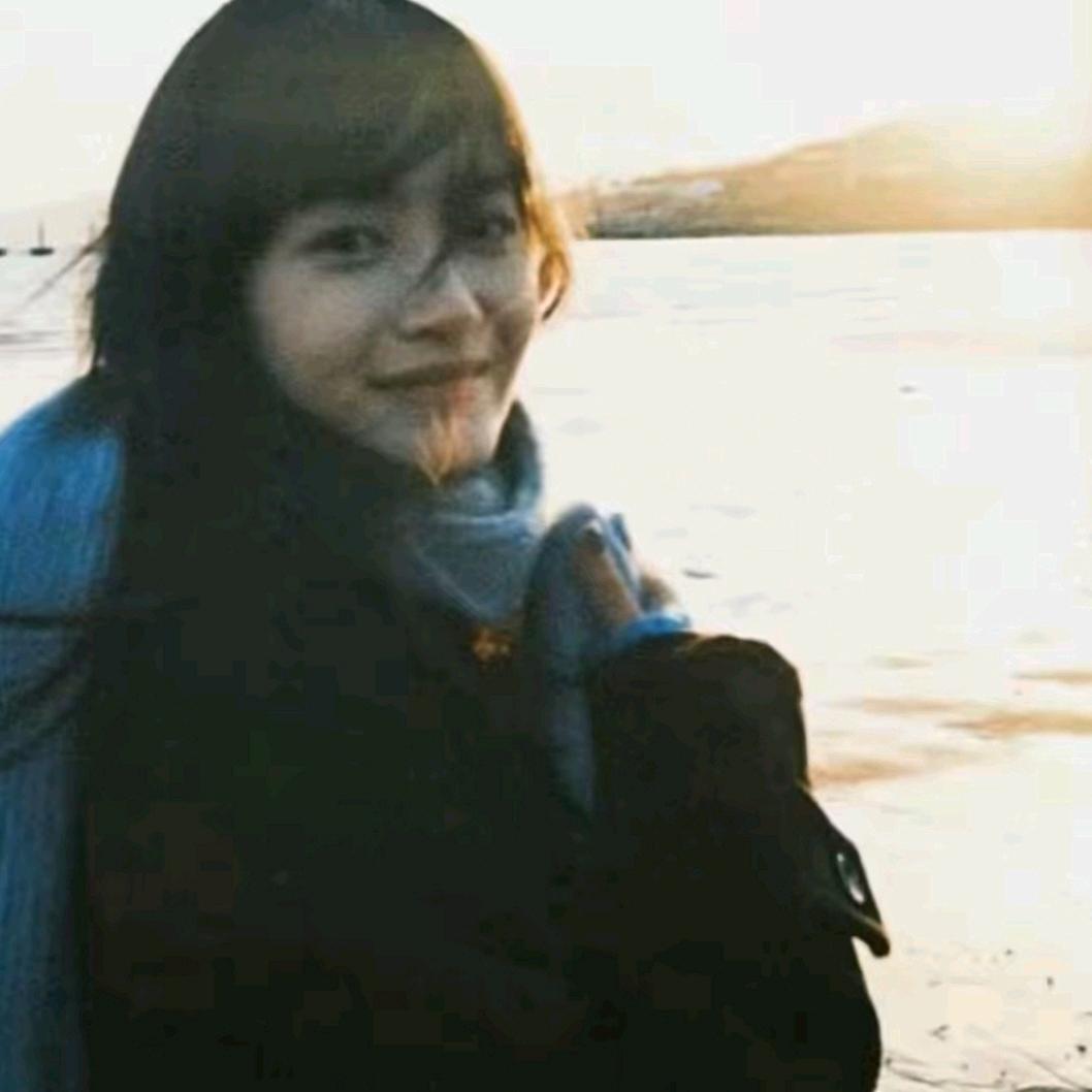 妩