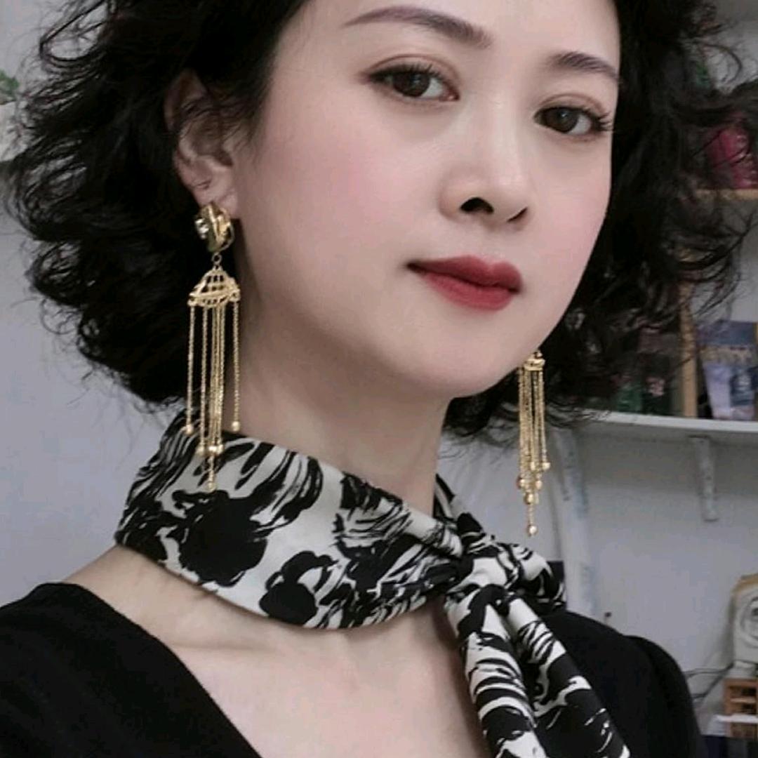 沐雨潇潇盼金归