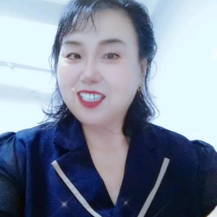 乐红英。