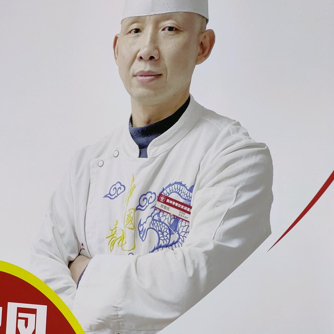 光头老何