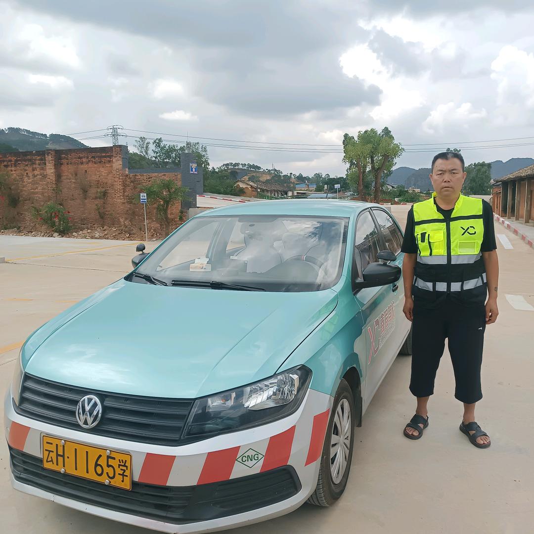 丘北驾培杨师