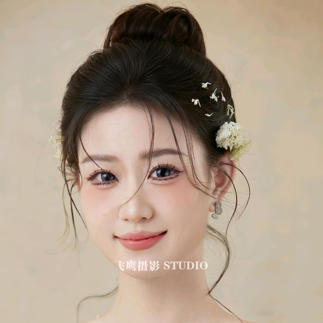 益阳飞鹰婚纱门市琪琪