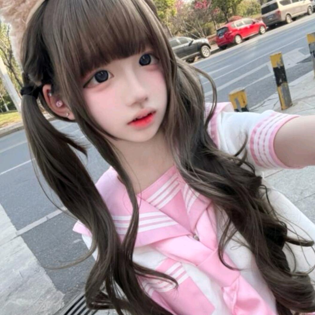 奕然.