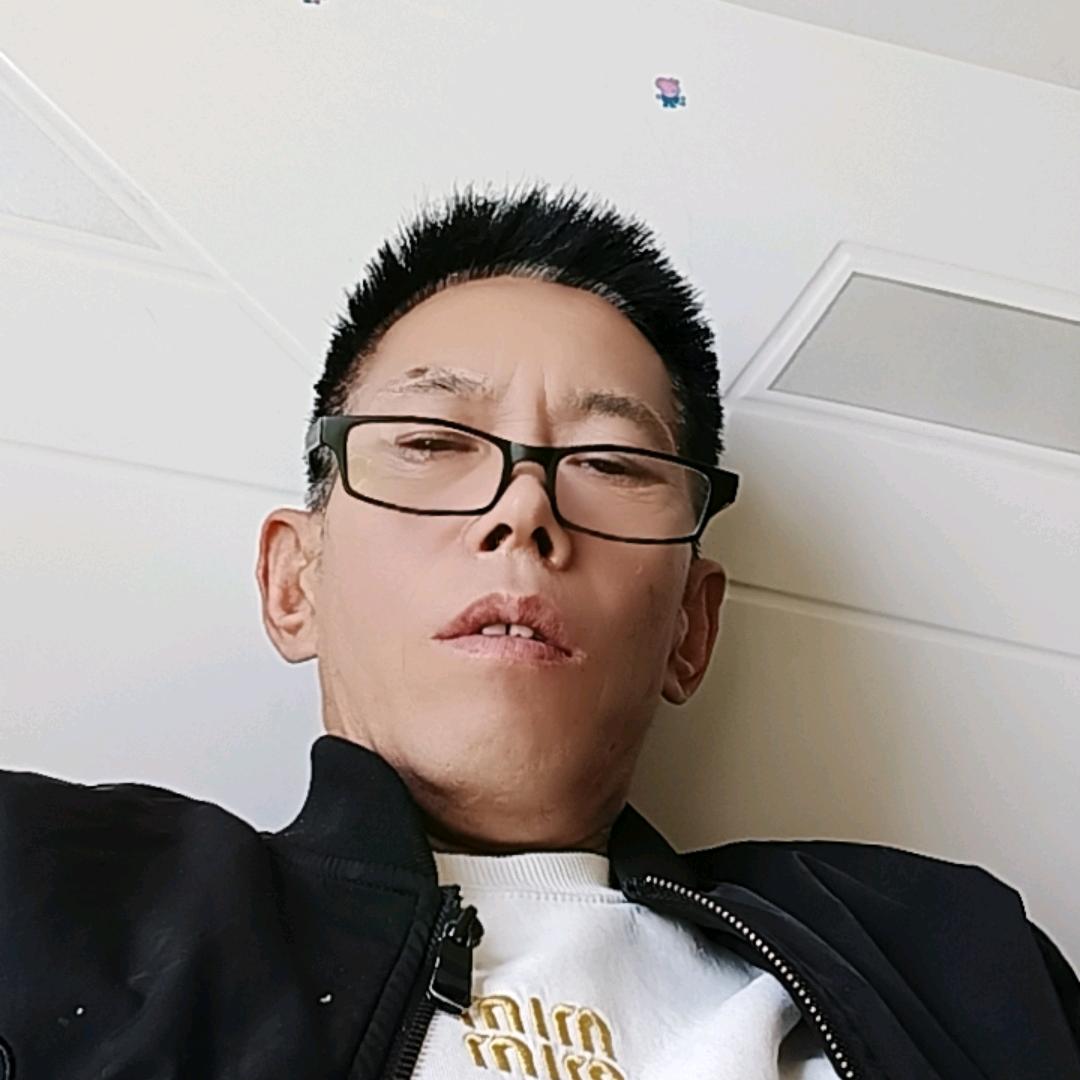 梁现志