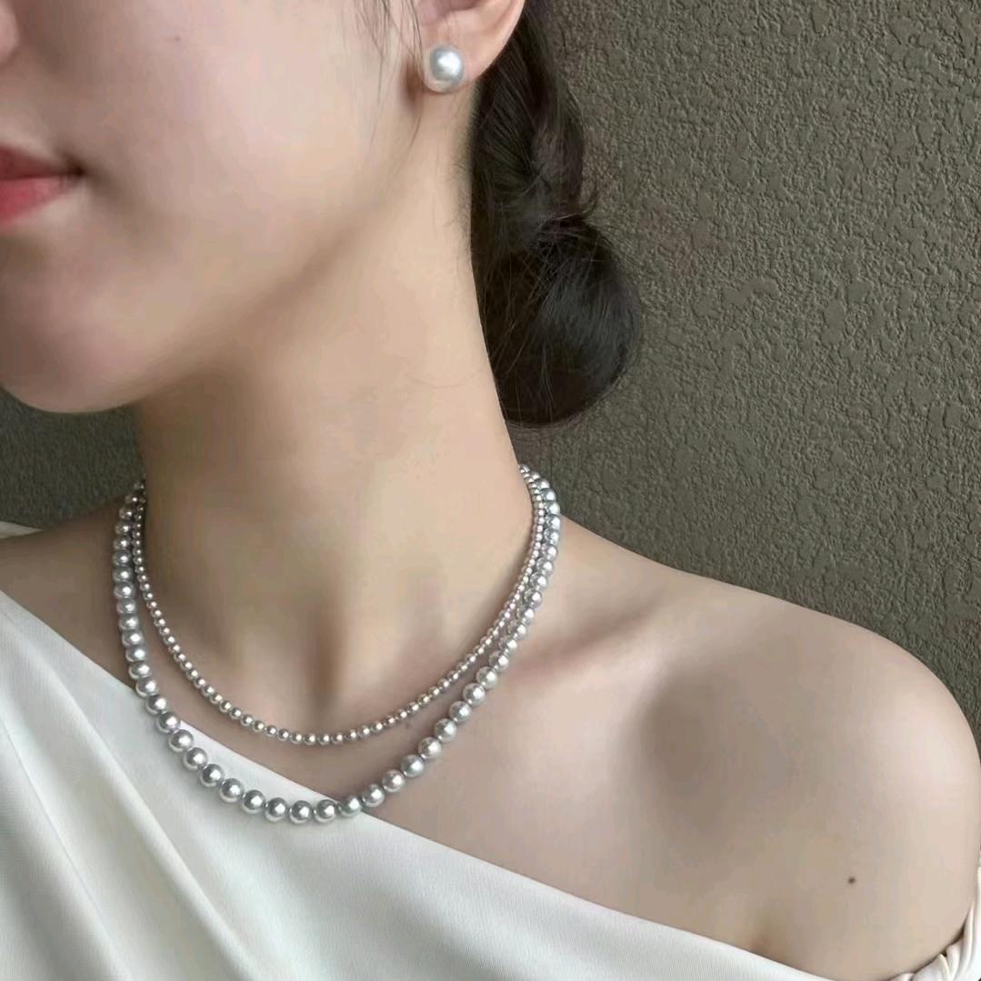 戴珍珠耳环的我