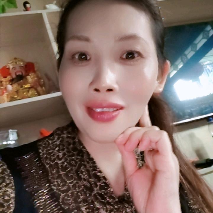 淡然一笑