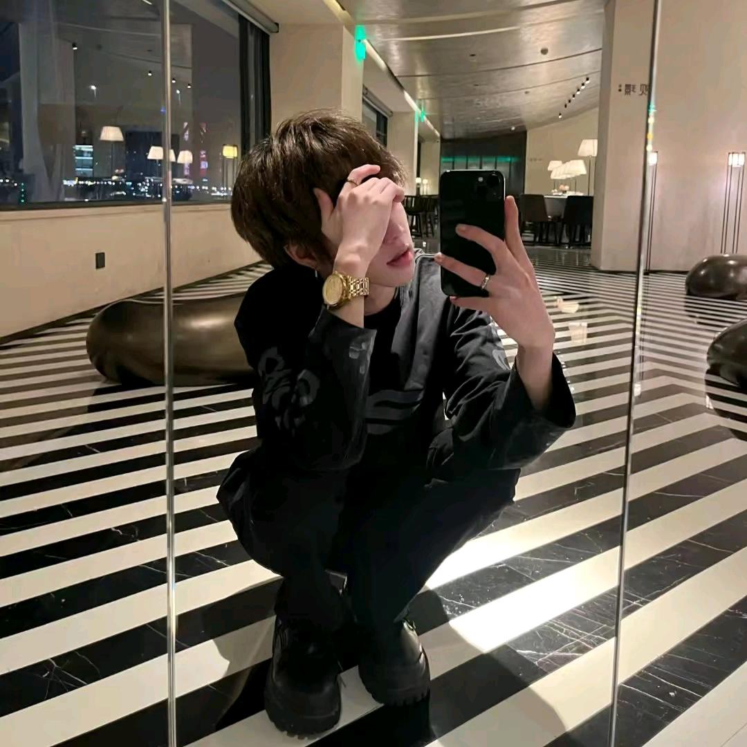 张～