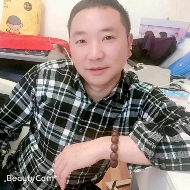 廣结四方善缘胡庆明