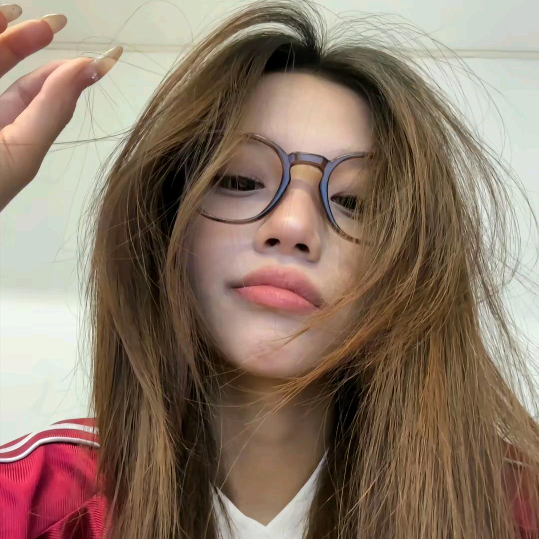 T.