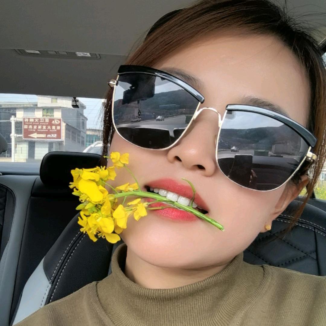 欢子.