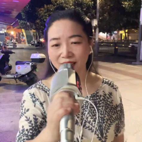 心怡唱歌