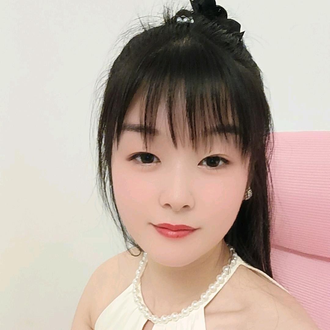 嫣然