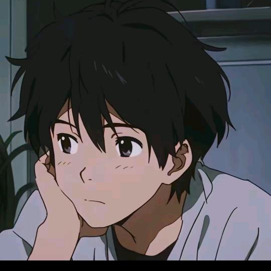 T.