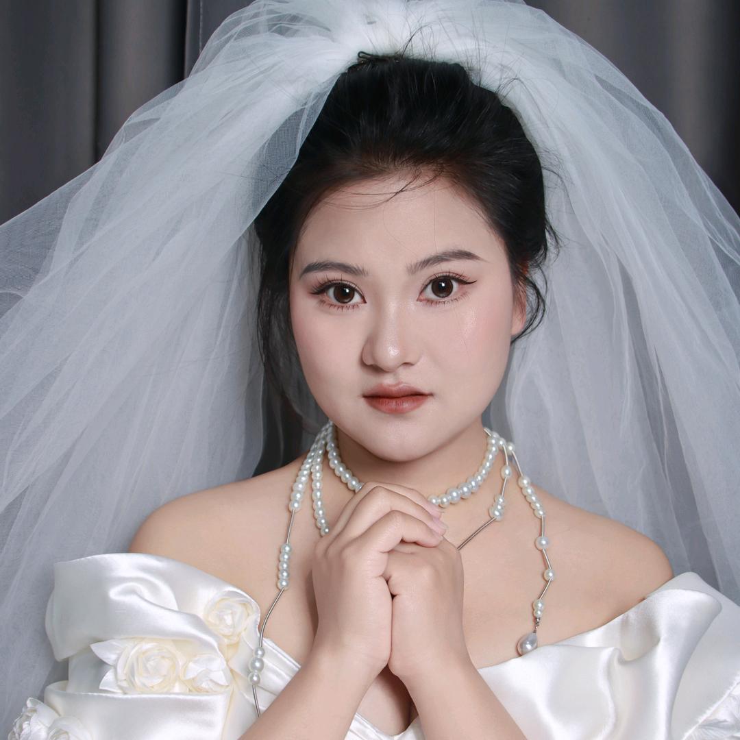 倾慕礼服馆化妆师程程