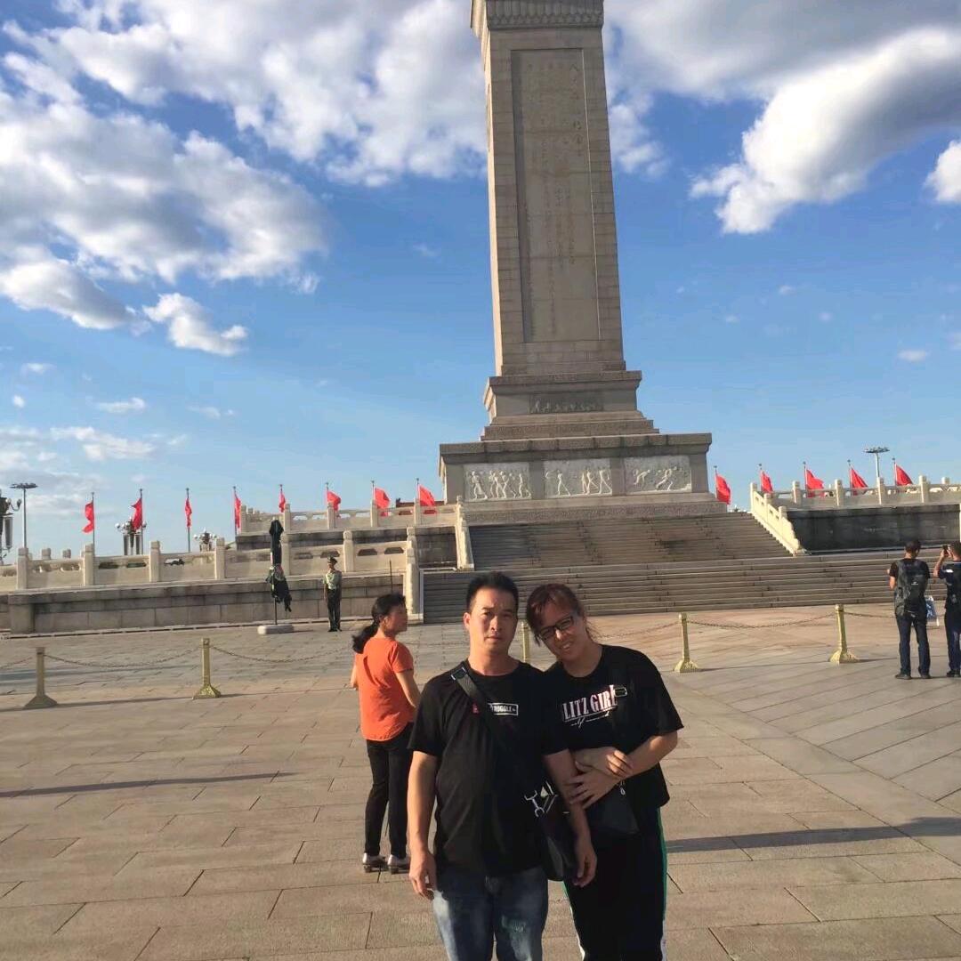 覃明