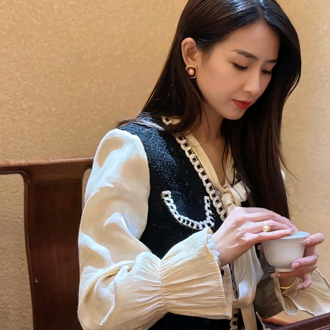 熙熙品茶