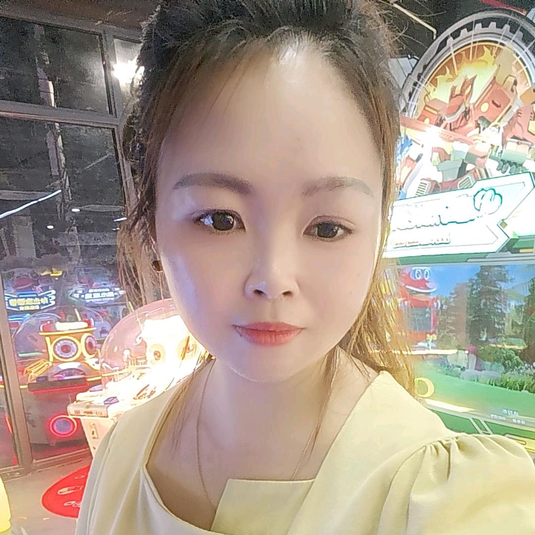 嫣然