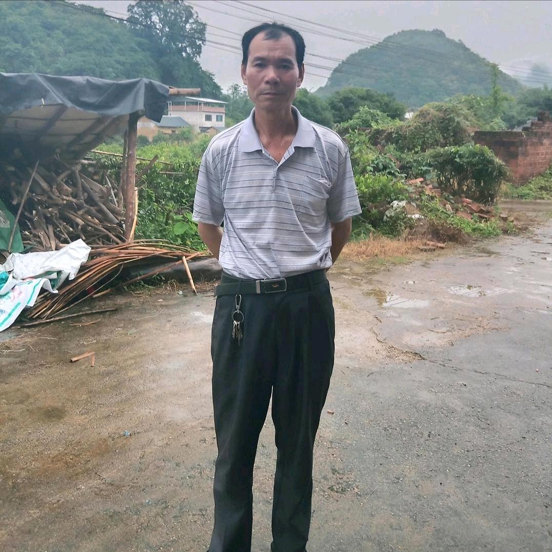 屈启志