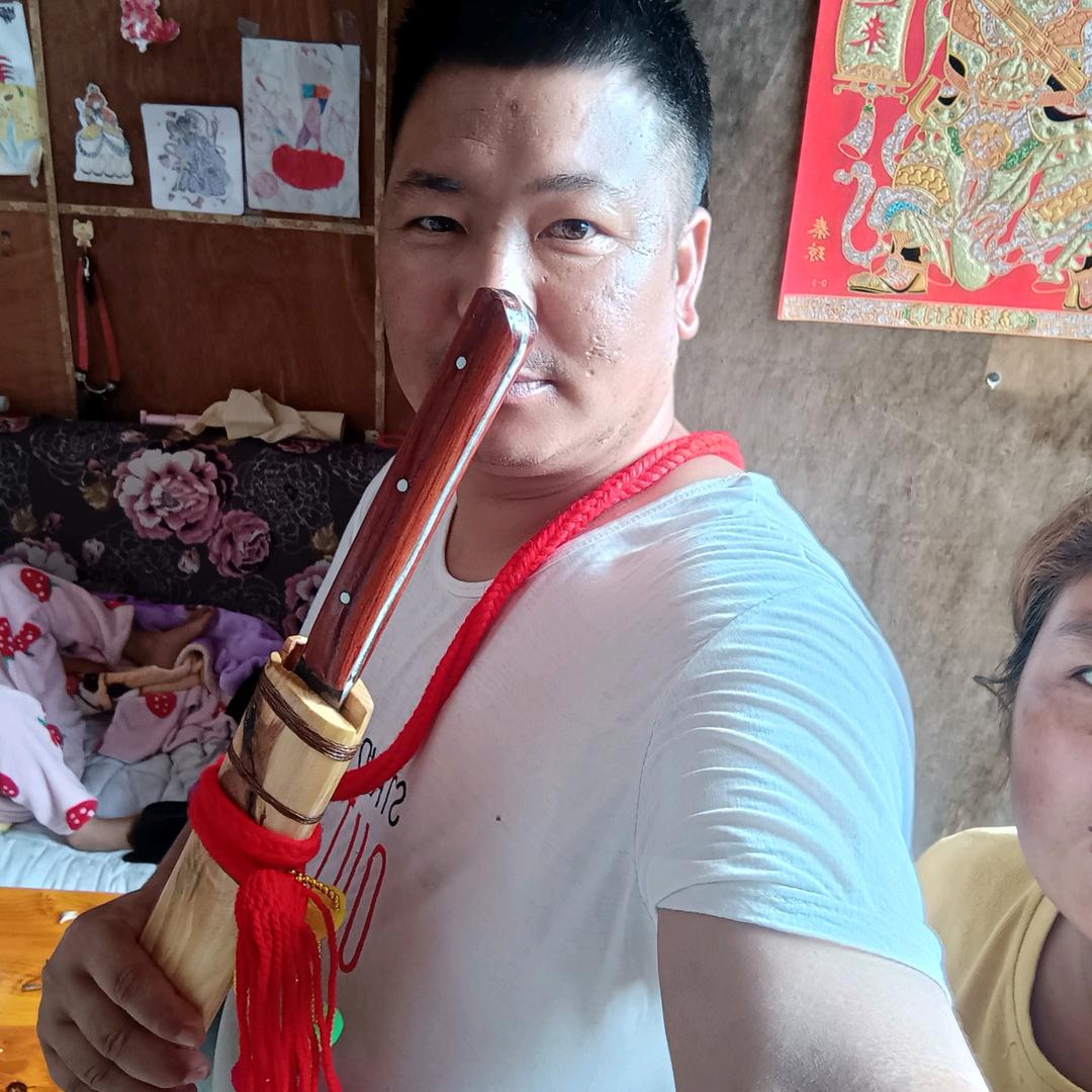 龙陵龙新啊江哥炸鸡店。