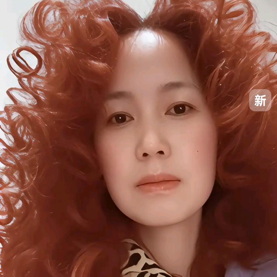 嫣然一笑
