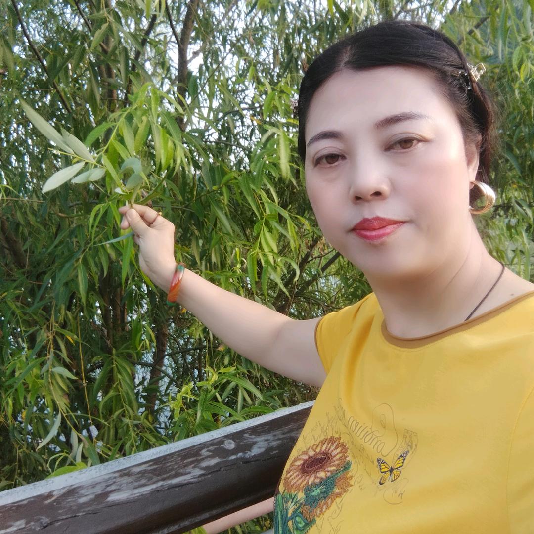 贵州.遵义鸭溪.卖装饰画的（敖姐）
